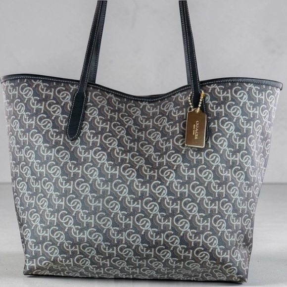 Coach Handbags - Coach City Tote Navy monogram leather, and coated canvas EUC CF342